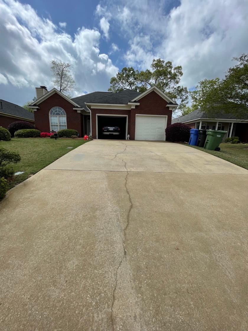 Driveway concrete after cleaning by Team Clean in the Columbus GA area