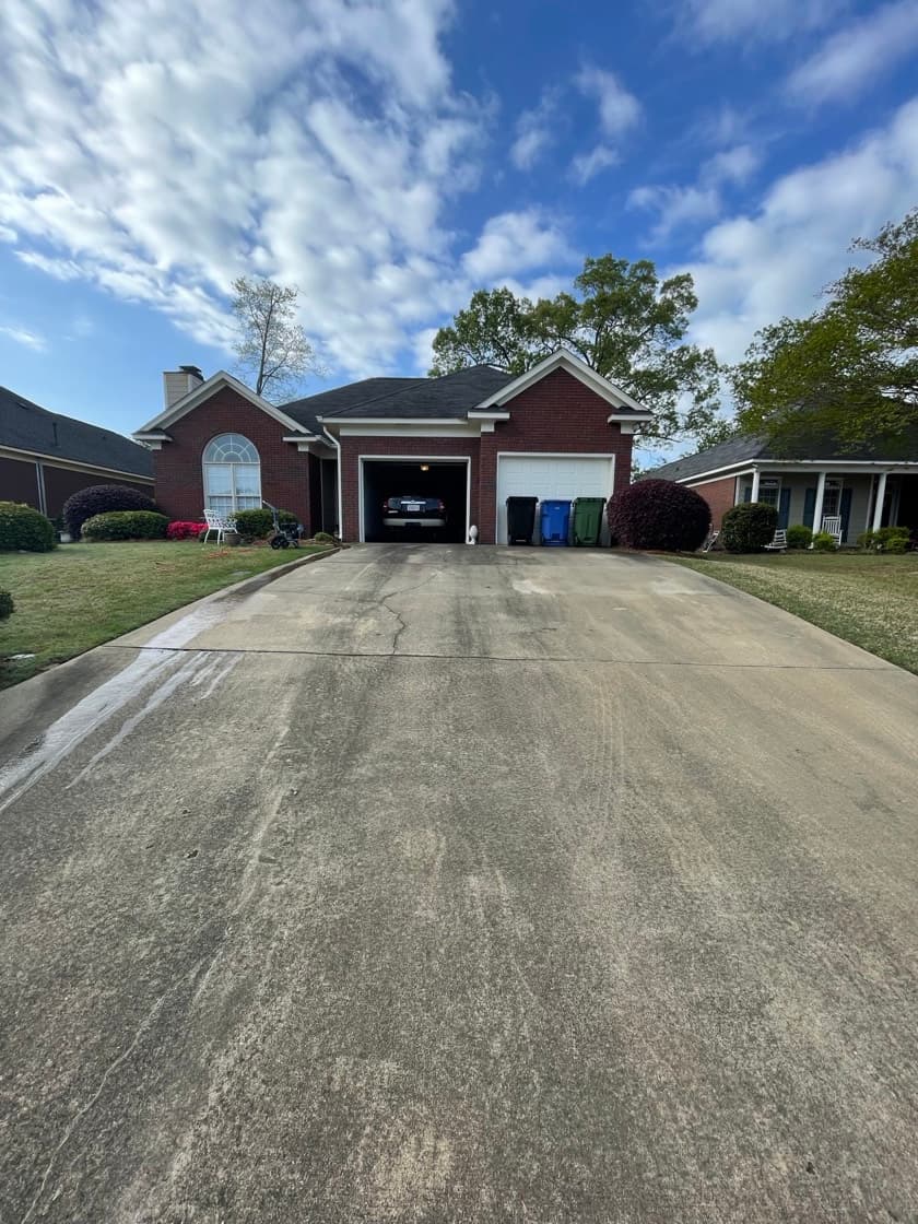 Driveway concrete before cleaning by Team Clean in the Columbus GA area